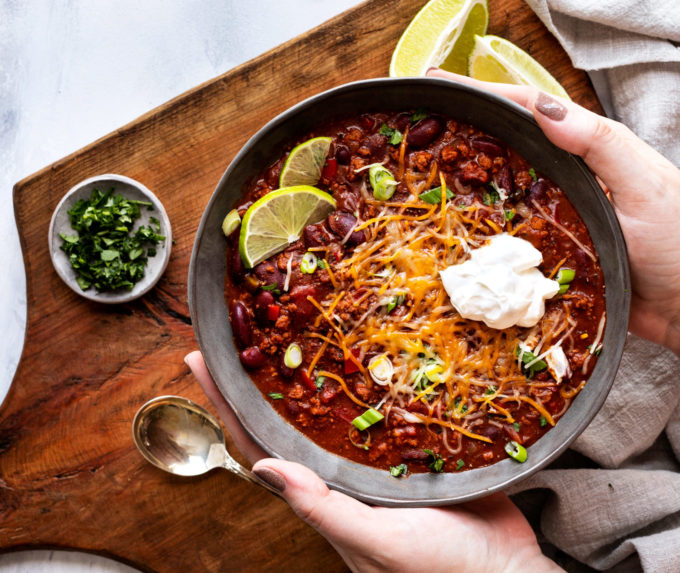 Holding a bowl of Instant pot chili
