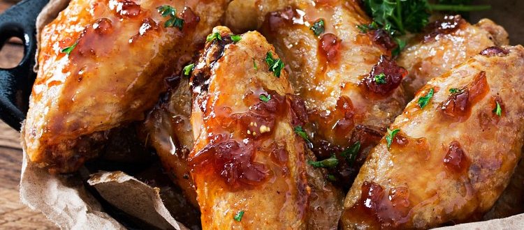 Jack Daniels Glazed Baked Chicken Wings | No need to fry... these baked chicken wings are SUPER crispy! Coated in a flavor-packed copycat Jack Daniels sauce, they're the perfect appetizer! | http://thechunkychef.com