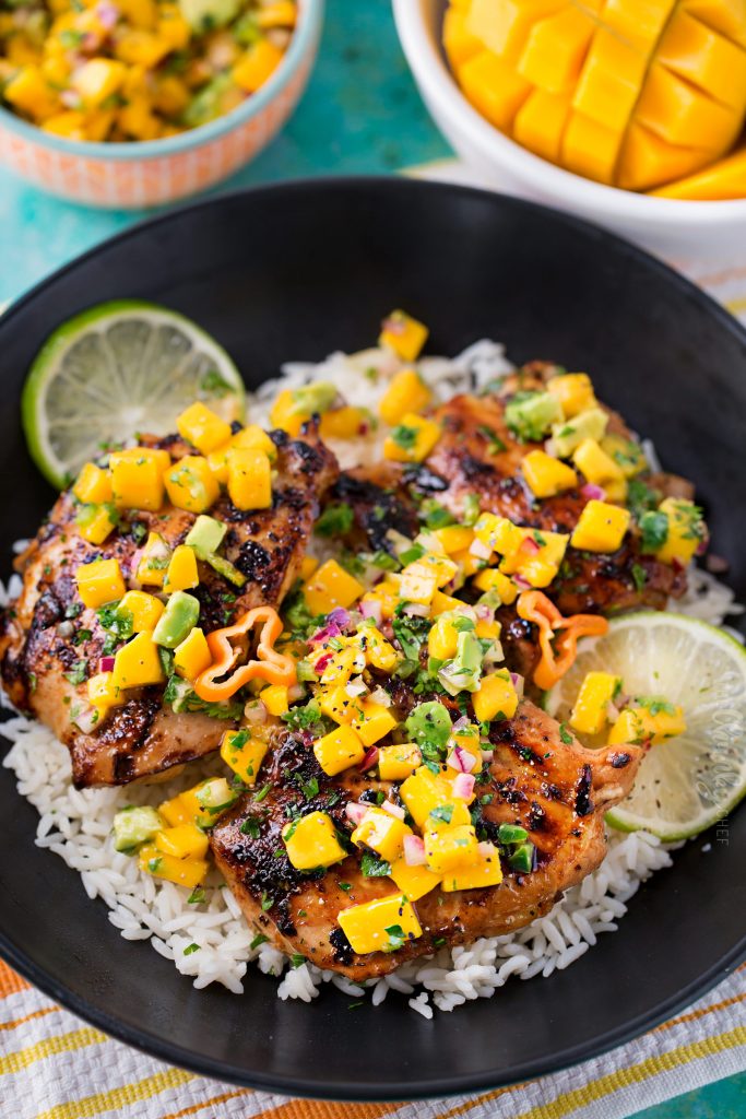 Jerk Chicken Thighs with Avocado Mango Salsa - The Chunky Chef