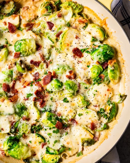 Sprouts in skillet with cheese and bacon