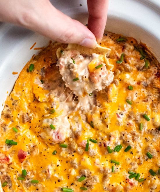 Cheesy Crockpot Sausage Rotel Dip - The Chunky Chef