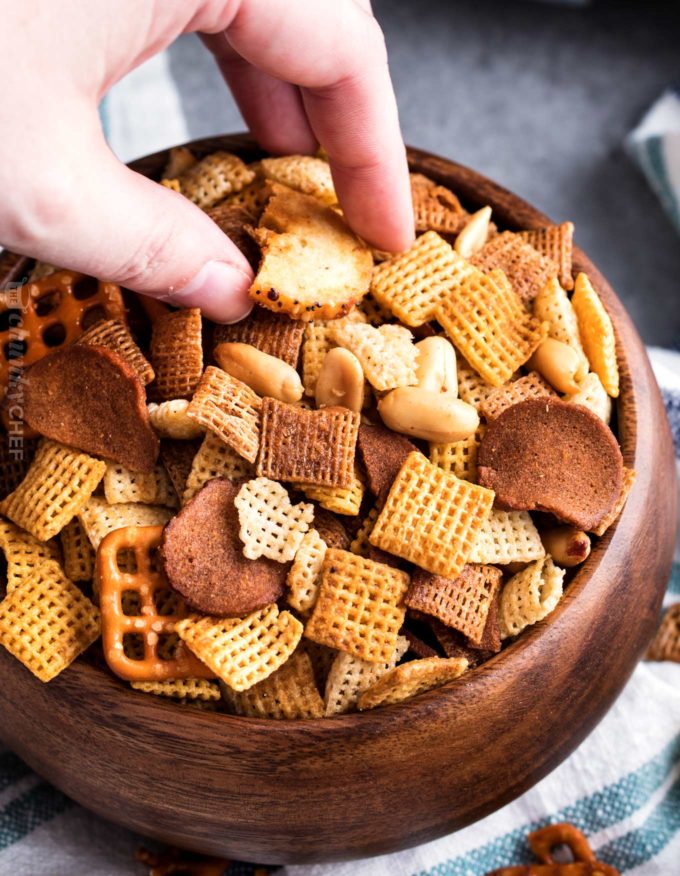https://www.thechunkychef.com/wp-content/uploads/2018/12/Slow-Cooker-Bold-Chex-Mix-Recipe-hand-680x876.jpg