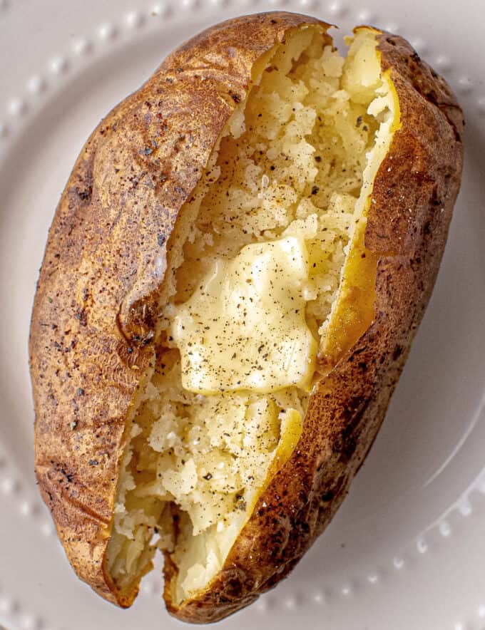https://www.thechunkychef.com/wp-content/uploads/2022/03/Air-Fryer-Baked-Potatoes-feat-680x884.jpg