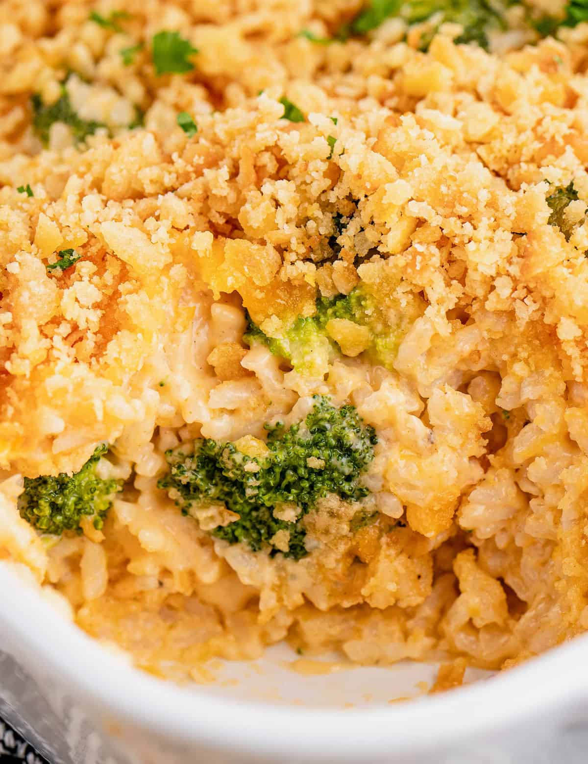 This delicious broccoli rice casserole is rich and cheesy, perfect for using up any leftover rice, and made from scratch with no "cream of" soups! The Ritz cracker topping adds the perfect buttery crunch!