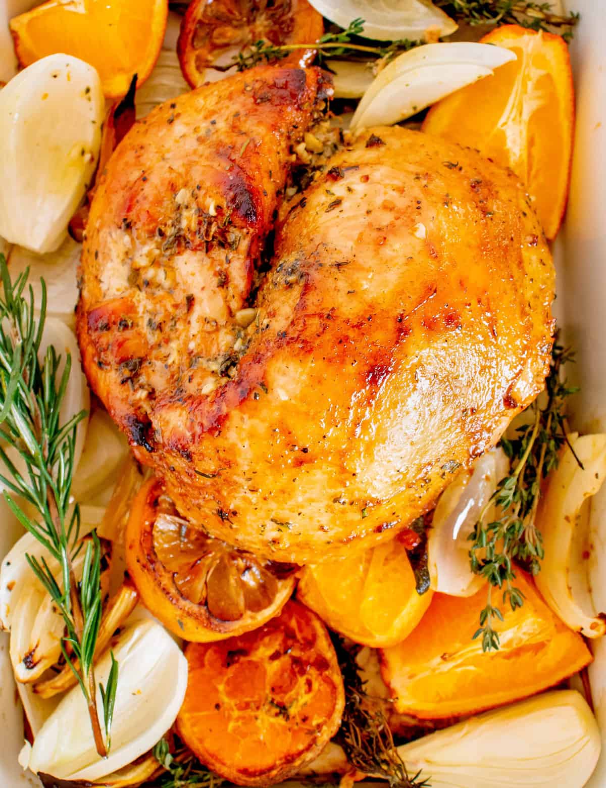 This boneless turkey breast is slathered in a savory citrus and herb butter, then roasted until crispy on the outside and moist and tender inside. It's perfect for your Thanksgiving or other holiday dinners!