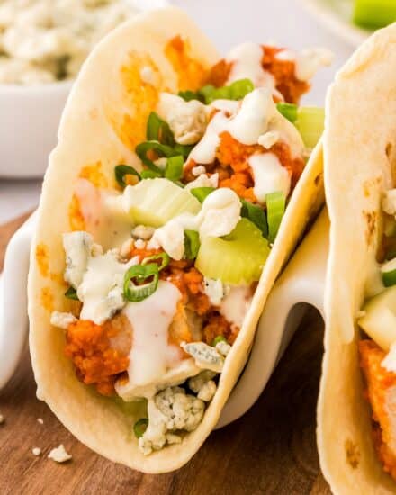 These buffalo chicken tacos are a great semi-homemade dinner or appetizer idea. Frozen chicken tenders make these super easy to get on the table, and fast!