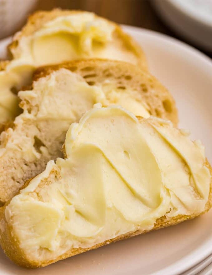 This recipe for simple and creamy homemade butter is made with just 1-2 ingredients (depending on if you want to make salted or unsalted butter), plus ice water. Who knew making butter could be so easy!