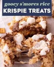 These gooey s'mores rice krispie treats are such an easy and fun to make dessert. This version is actually baked for just a few minutes to get the marshmallows on top nice and toasty, and the chocolate bars melted, just like a campfire s'more!