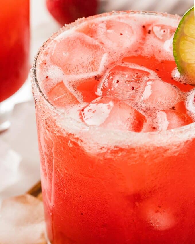 cold and refreshing strawberry margarita on the rocks.