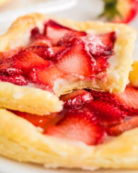 This easy shortcut recipe for a strawberry danish is made with store-bought puff pastry dough, a sweet cream cheese filling, and ripe juicy strawberries. Buttery, flaky, and sweet, this recipe is perfect for a decadent breakfast or brunch!