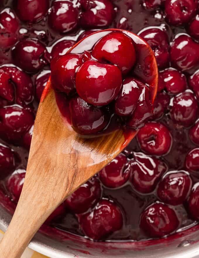 Homemade cherry pie filling is easy to make using sweet and juicy fresh cherries and simple everyday ingredients. Not only is it great to use to make a cherry pie, but pie filling is perfect on top of a cheesecake, ice cream, or just to eat with a spoon! So much better than the canned stuff.