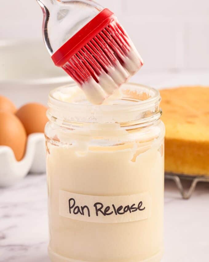 jar of pan release with a pastry brush.