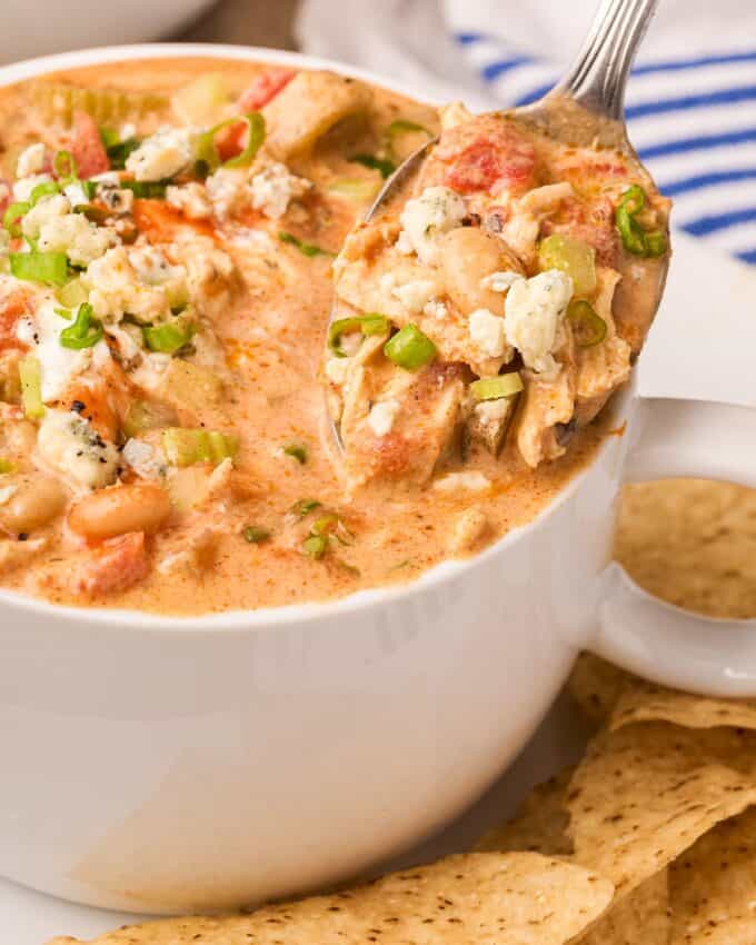 spoonful of creamy chicken chili with buffalo flavors.