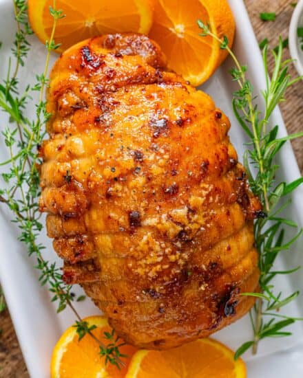 Save yourself some money during the holidays by making a Honey Baked Turkey Breast at home!  Moist turkey is cooked with butter and honey, then slathered with a sticky sweet and smoky glaze that’s broiled until it becomes a glorious sugary crust!