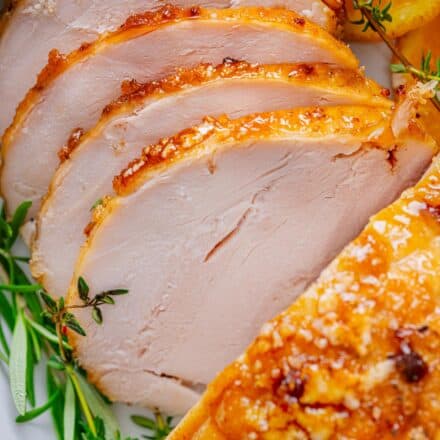 Save yourself some money during the holidays by making a Honey Baked Turkey Breast at home!  Moist turkey is cooked with butter and honey, then slathered with a sticky sweet and smoky glaze that’s broiled until it becomes a gloriously sugary crust!