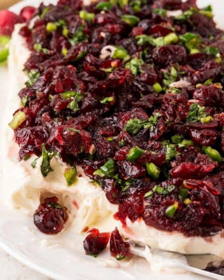 Whipped slightly sweetened cream cheese topped with a sweet, tart, and spicy cranberry jalapeño mixture. The red and green colors are perfect for the holidays, and this recipe uses dried cranberries to make this easy to make year-round. This is a dip that people go crazy over!