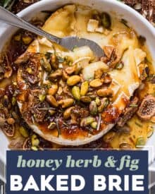 This honey herb and fig baked brie recipe is perfect for the holidays, or any party! A wheel of brie is topped with sweet fig jam, fresh rosemary, dried fig slices, salty pistachios, and sticky honey, then baked until perfectly gooey. Serve with baguette slices, apples, crackers, and more!