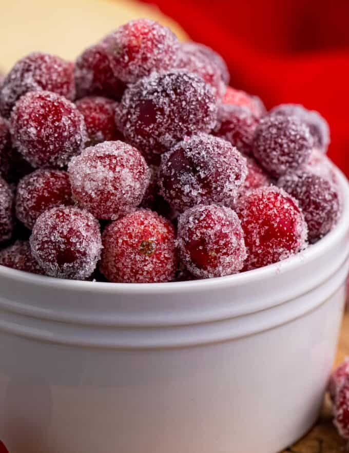 Making sugared cranberries transforms the usually tart fresh cranberry to an almost candied flavor and texture. Perfect for garnishing fall and winter desserts, a fun snack, or an interesting addition to a charcuterie board!