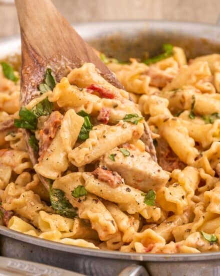 This Marry Me Chicken Pasta is a quick and easy meal that’s sure to be a family favorite! Juicy chicken, a creamy sauce made with bursts of sun dried tomatoes, Parmesan cheese, and spinach, and it’s all ready in about 40 minutes, making it a great weeknight dinner option.